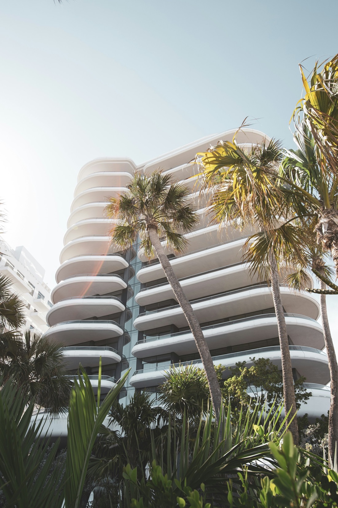 Contemporary Miami architecture framed by palm trees